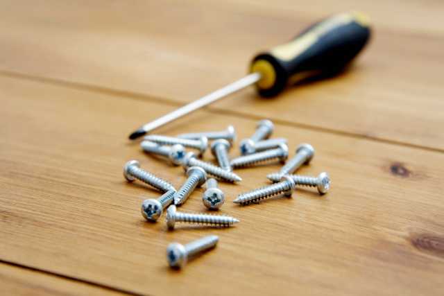 screws and a screw driver